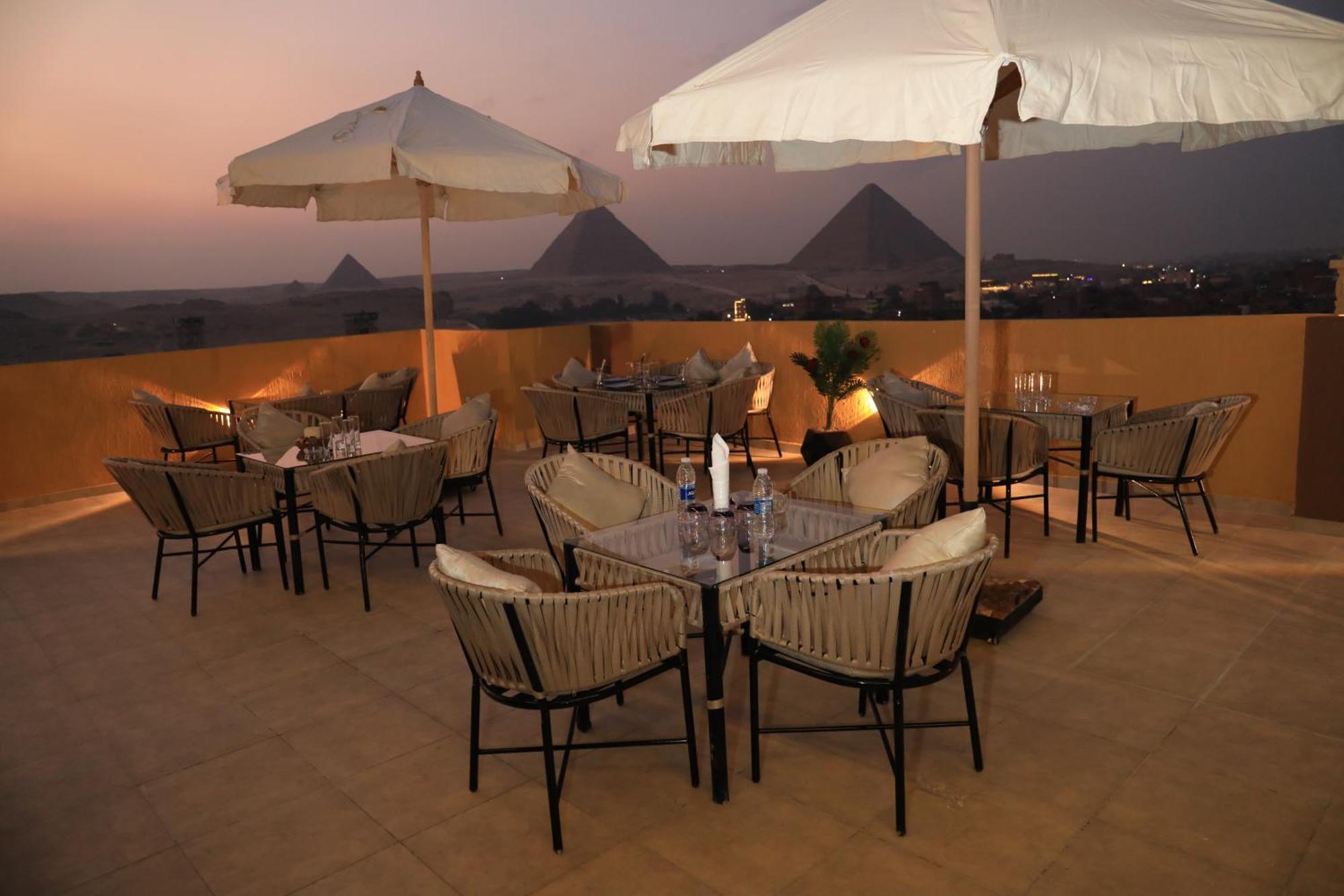 Pyramids Heart Hotel Kafrat al Jabal Exterior photo